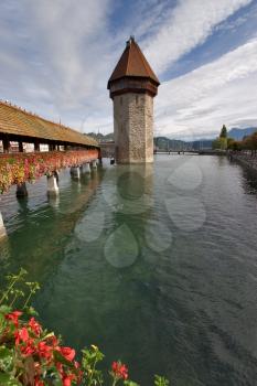 Royalty Free Photo of a Watchtower in Lake Lucerne