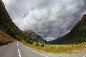 The magnificent mountain valley. Winding and dangerous road - the Serpentine. Photo taken by lens Fisheye
Italy, Dolomites