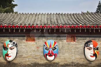 The painted huge masks in the Chinese park of entertainments