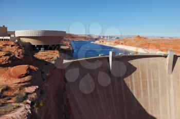 Glen Canyon Dam - the dam on the Colorado River in California. Away - blue water of Lake Powell