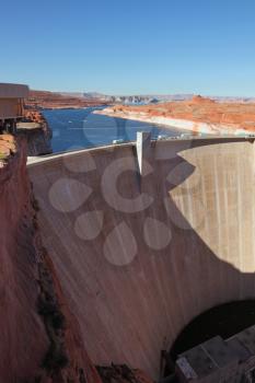 Glen Canyon Dam - the dam on the Colorado River in California. Away - blue water of Lake Powell