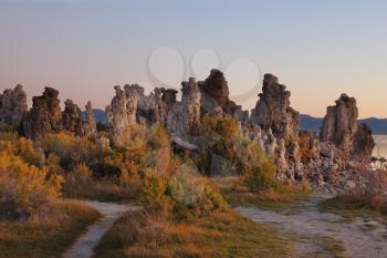 Magically beautiful sunrise. Sunrise at Mono Lake in the crater of an ancient extinct volcano. Shallow lake, a multitude of picturesque reefs Tufa
