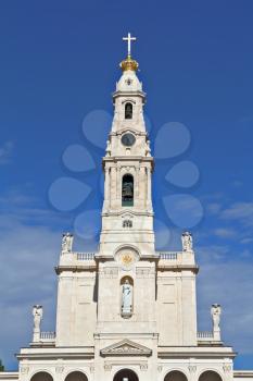 The religious center in the small city of Fatima in Portugal. An obelisk topped with a cross, are constructed on that place where many years ago the Madonna has appeared before children-shepherds

