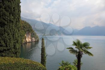 Lake Como in the misty haze. Magnificent park on the shore - Villa Balbianella
