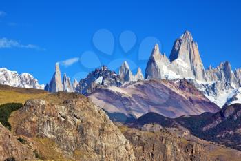 Magnificent panorama of snow-capped mountains in Patagonia. Famous rock Fitz Roy peaks in the Andes. 
