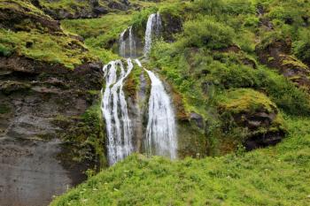 Abounding scenic waterfall near Selyalandfoss. Iceland, July