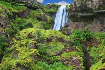Gorgeous high waterfall near Selyalandfoss. Iceland, July