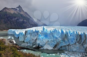 Colossal Perito Moreno glacier in Lake Argentino. Los Glaciares National Park in Patagonia. Sunny summer day