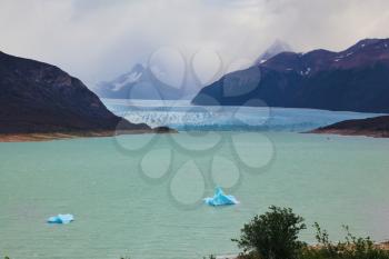 Colossal Perito Moreno glacier in Lake Argentino. Los Glaciares National Park in Argentina. Wintry summer day