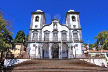 Sights of the Portuguese island of Madeira. Magnificent white church of Nossa-Senior-du-Monty. To the building the long picturesque ladder conducts