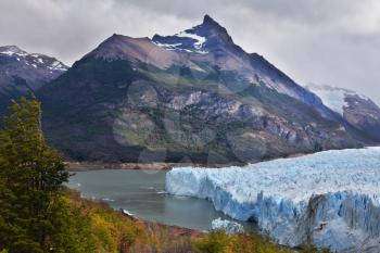 Colossal Perito Moreno glacier in Lake Argentino. Los Glaciares National Park in Patagonia. Wintry summer day