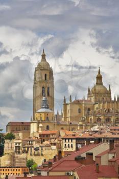 Cathedral in Segovia on a background of the cloudy sky 