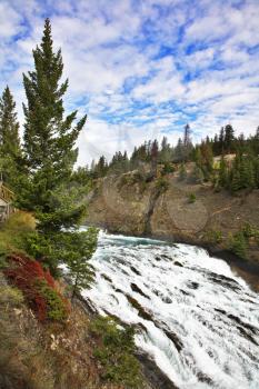  A falls on the fast river in mountains of Canada