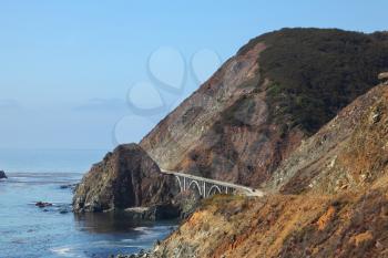 Majestic viaduct on the picturesque shore of the Pacific Ocean