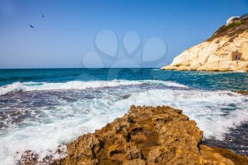 The grottoes of Rosh Ha Nikra. Rocks of white limestone on the shores of the Mediterranean Sea. Geological phenomenon in the north of Israel, on the border with Lebanon