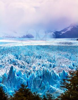 The concept of active and extreme tourism. The spectacular glacier Perito Moreno, located in the national park of Los Glaciares in Patagonia