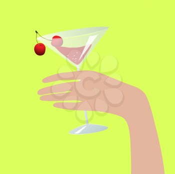 hand holding a cherry cocktail glass