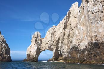 Royalty Free Photo of a Natural Arch Over the Ocean