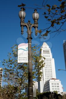 Royalty Free Photo of Los Angeles City Hall By a Streetlight