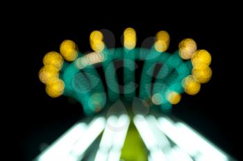 Royalty Free Photo of the Top of a Midway Ride That's Blurry