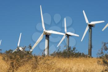 Royalty Free Photo of Wind Turbines on a Hill