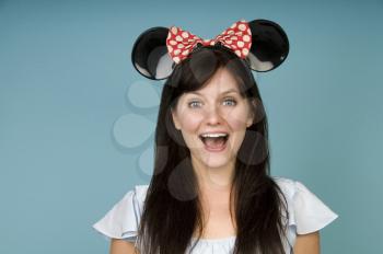 Royalty Free Photo of a Woman in Mouse Ears