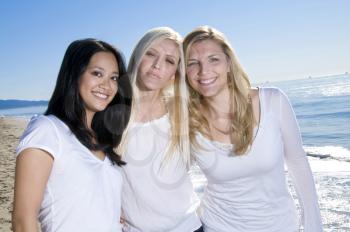 Royalty Free Photo of Three Women on the Beach