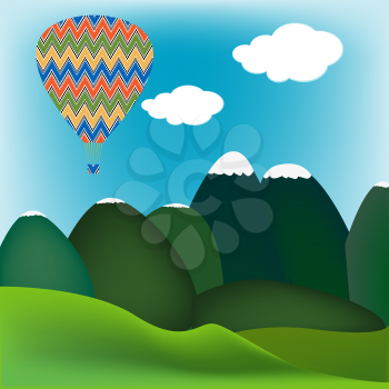Hot air ballon over a mountain landscape