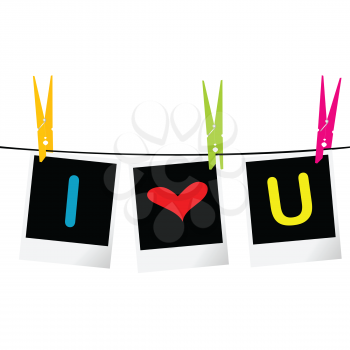 I love you concept with photo frames hanging on rope and colored pegs
