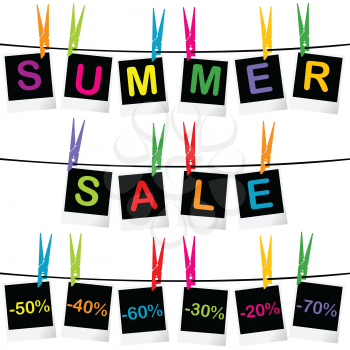 Summer sale concept with photo frames hanging on clothespins
