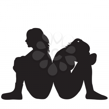 Silhouettes of two young women sitting on the floor