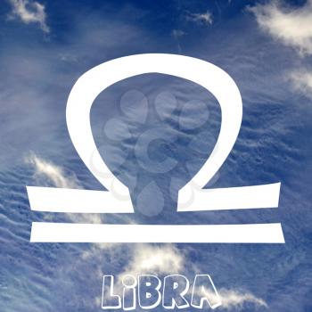 Libra zodiac sign on air element background