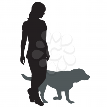 Silhouette of a woman with a dog on a walk