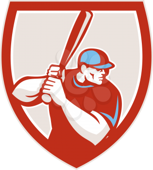 Illustration of a american baseball player batter hitter looking to the side holding bat ready to strike set inside shield crest on isolated background done in retro style.