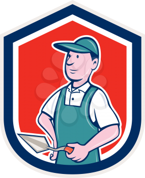 Illustration of a bricklayer mason plasterer worker standing holding a trowel set inside shield crest on isolated background done in cartoon  style.