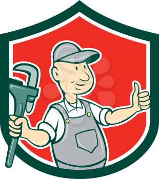 Illustration of a plumber thumbs up holding monkey wrench set inside shield crest  on isolated background done in cartoon style.