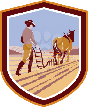 Illustration of farmer and horse plowing farm field viewed from back set inside crest shield done in retro style on isolated background.