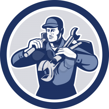 Illustration of a repairman mechanic tradesman handyman worker carrying spanner wrench and spade viewed from front iset inside circle on isolated background done in retro style.
