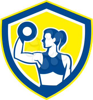 Illustration of a woman lifting dumbbell weights physical fitness training viewed from the side set inside shield crest on isolated background done in retro style.