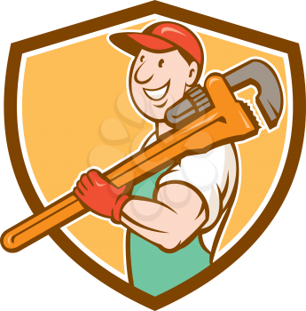 Illustration of a plumber in overalls and hat smiling holding monkey wrench on shoulder set inside shield crest shape on isolated background done in cartoon style.
