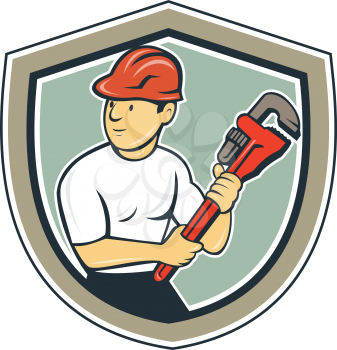 Illustration of a plumber with hardhat holding monkey wrench looking to the side set inside shield crest on isolated background done in cartoon style.