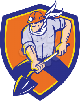 Illustration of a coal miner wearing hardhat holding shovel digging viewed from front set inside shield crest on isolated backgorund done in retro style.