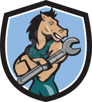 Illustration of a horse mechanic with arms crossed holding spanner looking to the side set inside shield crest on isolated background done in cartoon style. 