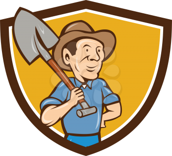 Illustration of an organic farmer holding shovel on shoulder looking to the side viewed from front set inside shield crest done in cartoon style. 