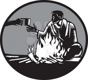 Illustration of camper with a sleeping bag wrapped around his shoulders, holding on tight, sitting in front of a fire, accepting a tin cup of hot coffee set inside circle done in retro woodcut style. 