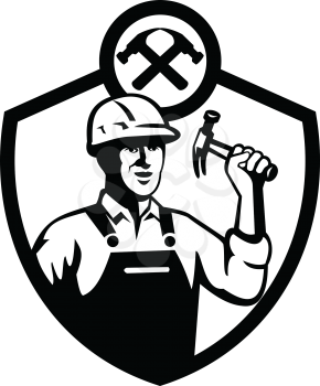Black and white illustration of a carpenter builder holding hammer set inside shield crest shape on isolated white background done in retro style.
