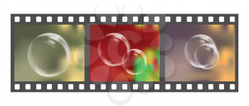 Royalty Free Clipart Image of a Filmstrip With Bubbles