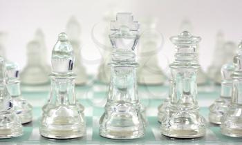 Royalty Free Clipart Image of Glass Chess Pieces