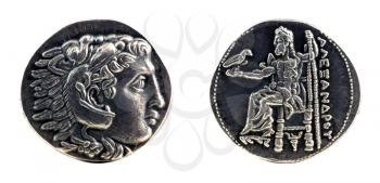 Royalty Free Photo of Greek silver tetradrachm from Alexander the Great showing Hercules wearing lion skin at obverse and Zeus at reverse, dated 323-315 BC.
