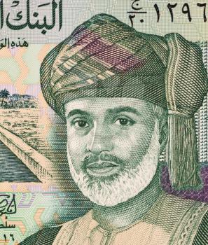 Royalty Free Photo of Sultan Qaboos (1940-) on 100 Baisa 1995 Banknote from Oman. Sultan of Oman.